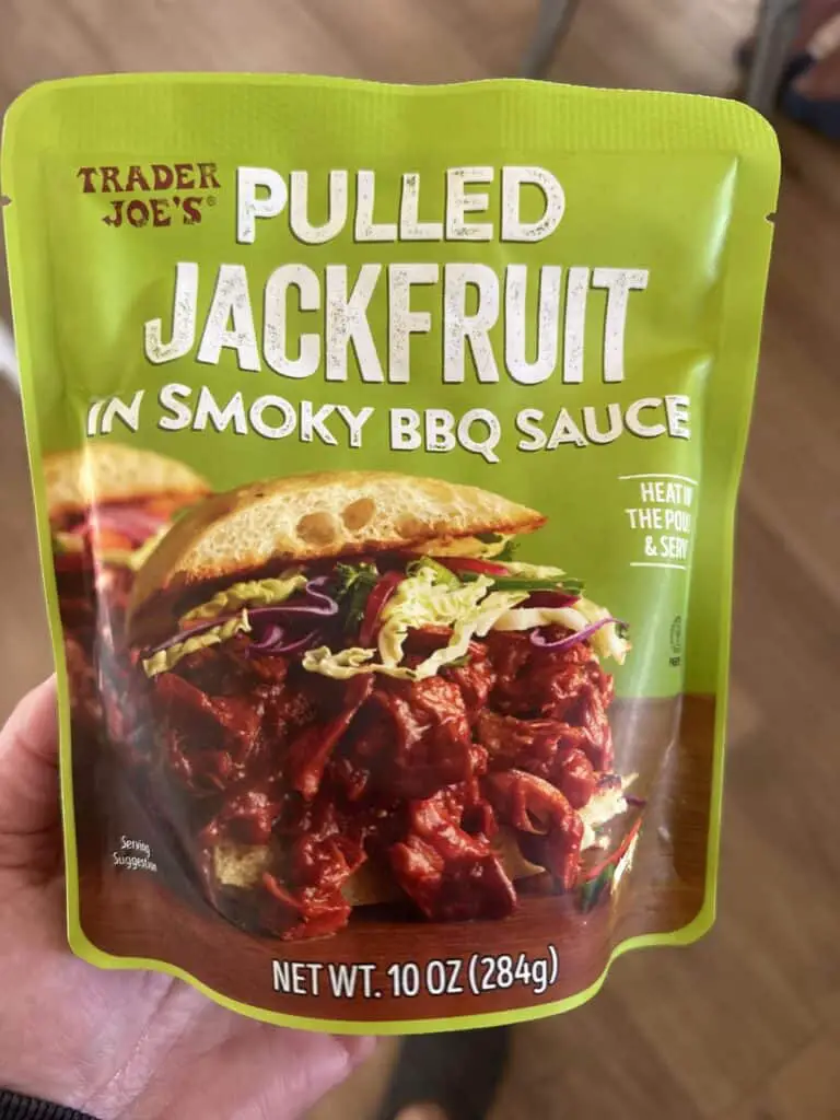 Green package of pulled jackfruit in smoky BBQ sauce.